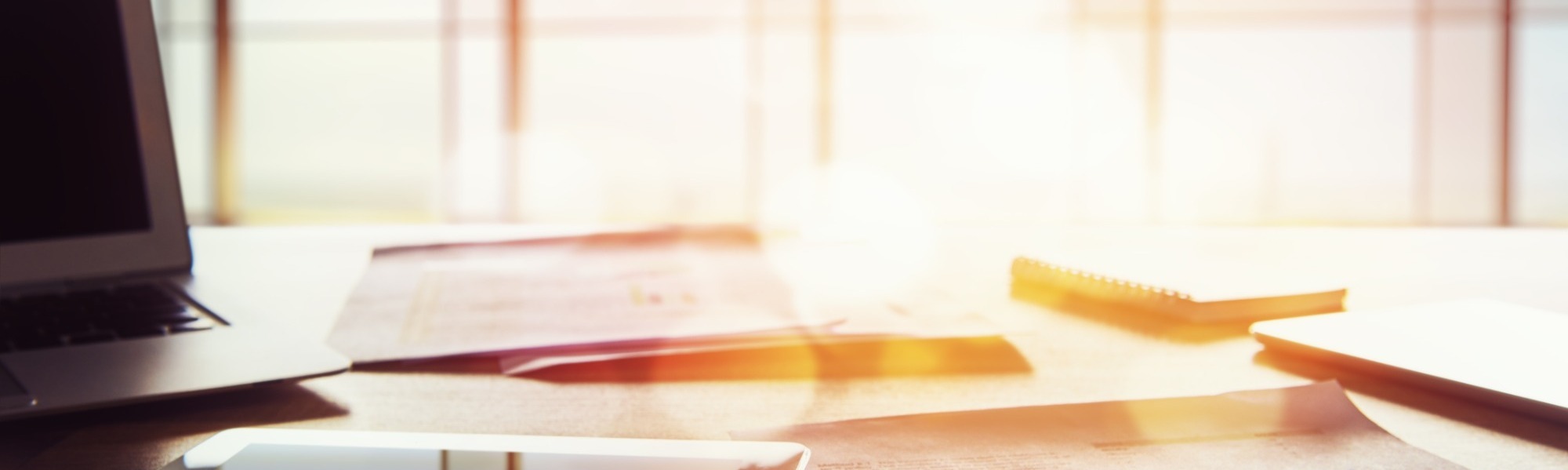 soft focus image of a desk in sunlight