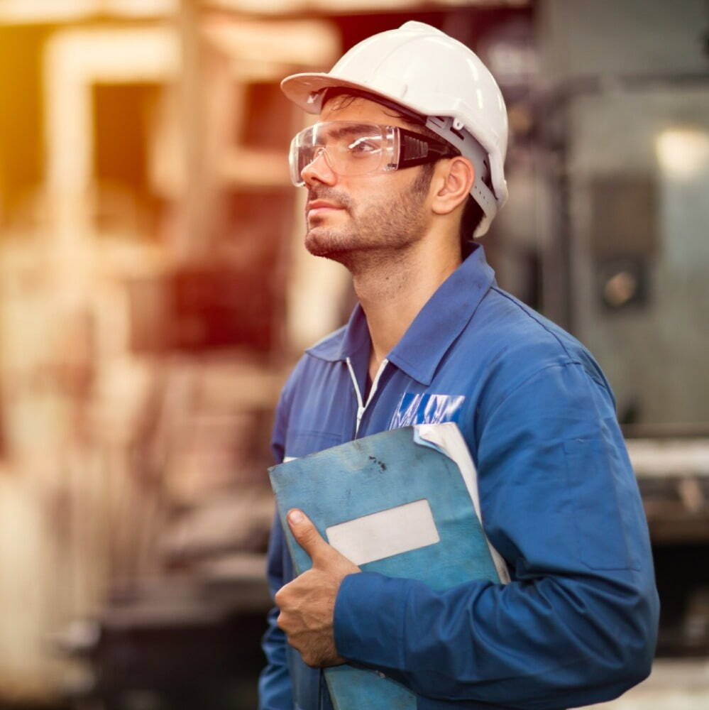 photo of male engineer in blue uniform